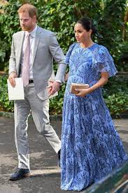 The picture shows harry (red beard and all) holding archie's hand. Meghan Markle Prince Harry Photos Together Meghan Prince Harry S Sweetest Moments