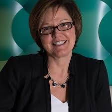 Colleen Mondry and Dr. Randall Little (Dental Management Advisors) helping… 