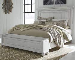 Perhaps you have your heart set on a king size bed, but there is not enough room for this large bed and the dressers and chests for storage. Kanwyn Queen Panel Bed With Storage Bench B777b6 54s 57 96 Complete Beds The Furniture Barn Ia