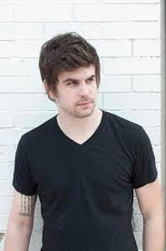 Adam Jensen Adam Is A Singer Songwriter From Boston His Songs Reach Out And Grab You They Are About The Darker Side O Singer Songwriting Singer Songwriter