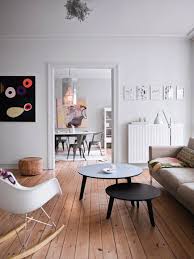 A White Interior Design With Wooden Flooring Interior Home Living Room House Interior