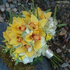 Gorgeous simple yellow orchid bouquet. Bouquet Bridal Yellow Orchid Bouquets Yellow Wedding Flowers Orchid Bouquet Yellow Bouquets