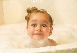 Happy baby isn't particularly dangerous, but you don't want to learn incorrect practices. Little Beautiful Girl Posing Inside Of A Bathtub With Water And Foam In Bath Doing Funny Faces Stock Photo Picture And Royalty Free Image Image 77354582