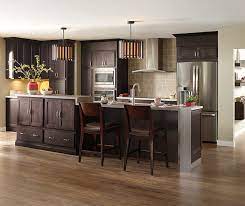 Over that stretch of almost one hundred years, they have brought beauty and functionality into homes across the nation. Dark Finish Modern Kitchen Cabinets Kemper Cabinets