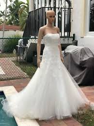 It hugs the body in all the right places and gradually flares outward. David S Bridal Mermaid Trumpet Strapless Tulle Lace Wedding Dress Fit Flare Slip Ebay