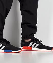 A black continental rubber outsole completes the original look. Adidas Nmd R1 Black White Red Blue Shoes Zumiez