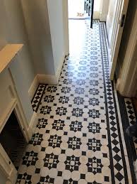 Victorian hand painted tile perfect condition and very fine detail wooded area. Repair And Restoration Of A Geometric Victorian Tiled Hallway In Palmers Green North London Cleaning And Maintenance Advice For Victorian Tiled Floors