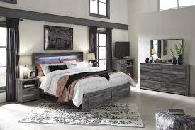 Clean lines and modern charm blend for an authentic look to be enjoyed for years to. Baystorm 4pc Panel W Footboard Storage Bedroom Set In Gray