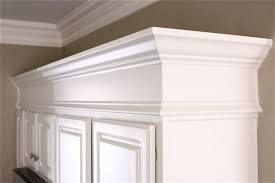 Making Cabinets Taller Builder Cabinets Go Custom With Molding With Images Builders Cabinets