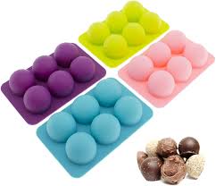 Chocolate molds have been around since chocolate consumption moved from predominately drinking chocolate to when purchasing chocolate molds, look for strong plastic with deep intricate designs. Amazon Com Silicone Chocolate Molds Round Truffle Small 6 Cavity 100 Non Stick Reusable Food Grade Silicone Molds For Hard Candy Bpa Free Dishwasher Safe 4 Pack Kitchen Dining