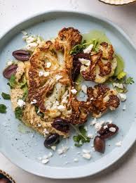 Roasted Cauliflower With Hummus Olives And Feta Recette Recettes De Cuisine Nourriture Recette De Plat