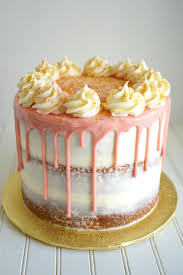 Pink is pretty and it goes so well with the gold! First Birthday Pink Gold Cake And Cupcakes The Baking Fairy