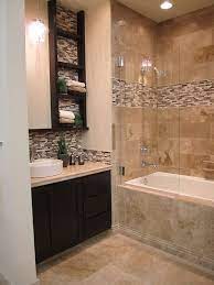This soft color palette that emphasizes the natural striation in the travertine. Travertine And Stone Glass Mixed Mosaic Bathroom Small Bathroom Remodel Bathroom Remodel Master Bathroom Tile Designs