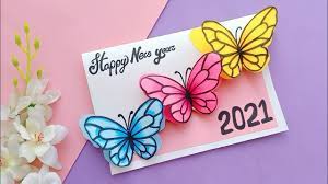 Write the text in calligraphy or decorative lettering, and use a gel pen or ink marker to make your text stand out from the card. How To Make Happy New Year Card Cute New Year Greeting Card Making Ideas Diy New Year Card 2021 Youtube