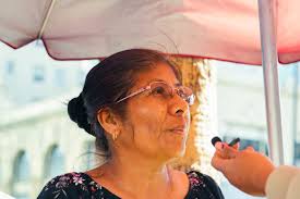 Youth photographers capture the hustle of 3 street vendors