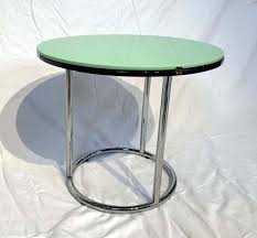 This uniquely simple form creates a these beautiful round glass coffee tables are available with a choice of glass table tops in red. Round Bauhaus Side Table In Chrome Black And Green Glass Germany 1930s For Sale At Pamono