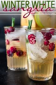 Winter White Wine Sangria This Silly Girl S Kitchen Recipe In 2020 White Wine Sangria Recipe White Wine Sangria Christmas Sangria Recipes