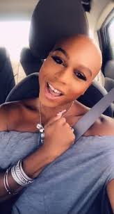 Black Bald Woman Singing in The Car