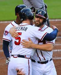 Braves Freddie Freeman Left Gives Evan Gattis A Hug At Home After He Hit A 3 Rbi Home Run To Take A 4 0 Lead Ov Atlanta Braves Baseball Braves Atlanta Braves