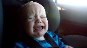 How To Comfort A Crying Baby In The Car Mom Com