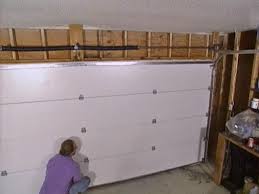 This is usually done by fastening two 2 construction of a garage door frame measure the distance from the garage floor to the ceiling. Installing A Garage Door How Tos Diy