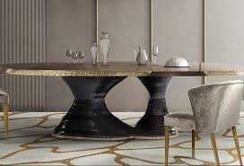 A modern glass dining table helps make a smaller dining room feel bigger and is a great solution for highlighting a statement area rug placed beneath the table. Modern Dining Tables Asian Interior Design