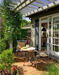 Outdoor patio ideas don't get more gorgeous than these! Cottage Style Back Patio And Pergola Summer Patio Decor Patio Balcony Design