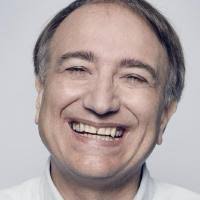 Towards a Drone Cinematographer: Guiding Quadrotor Cameras using Visual  Composition Principles