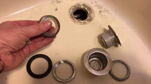 Cut the pieces of drywall to the sizes of your gaps with a reciprocating saw. Replacing The Tub Drain Flange In A 1988 Avion 34x Travel Trailer Youtube