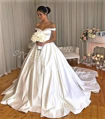 Wedding dresses factory bridal fashion presents catalogue of new bridal fashion collections. Special Offer 2020 New Simple Elegant Vintage Royal Off The Shoulder V Neck Backless Luxury Long White Satin Draped Ball Gown Wedding Dresses April 2021