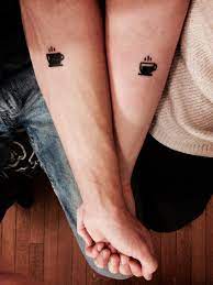 Coffee cup tattoos that you can filter by style, body part and size, and order by date or score. Black Coffee Cup Tattoo On Couple Forearm