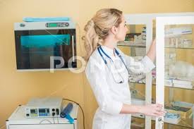 Young Woman Gynecologist Beautiful Female Doctor In Hospital Medical Office Premium Photo 104297664 With Images Female Doctor Gynecologists