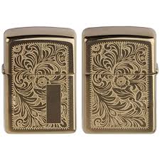This high polish brass lighter features a decorative pattern design engraved around the zippo logo. Zippo Venetian 352b Lighter Zippo Lighter Zippo Polished Brass
