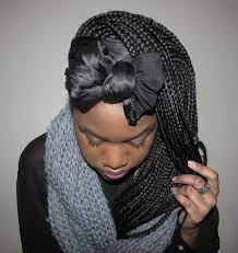 Medium Single Braids Styled With Wrapped Bow Single Braids Styles Single Braids Braid Styles