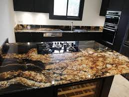 Les éléments sanitaires de la cuisine sont l'évier, la robinetterie et tous les accessoires qui améliorent le confort de travail et l'esthétique de cette pièce de vie. Plan De Travail De Cuisine En Granit Noir Et Or Black Fusion Installation A La Seyne Sur Mer Black Fusion Black Taurus Marbrerie De La Crau Pierre Marbre Granit Quartz Ardoise Dallages Revetements