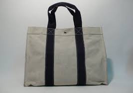 This handbag is constructed toile fabric in black with white threading. Hermes Vintage Sale N 1778 Lot N 645 Artcurial