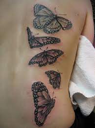 Black And Gray Monarch Butterflies By Russell Fortier At Lucky 7 Tattoo Tahoe Butterfly Tattoo Designs Butterfly Tattoo Monarch Butterfly Tattoo