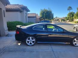 Image result for Cosmo 2004 Pontiac