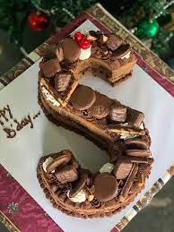 Then you can now decorate your cake with toppings of your choice. Creative Biya Chocolate Letter Cake With Chocolate Gift Facebook