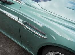 Image result for Almond Green 2010 Aston Martin