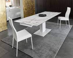 Gate legged dining tables have been around for a long time now, and they still provide a good answer for small homes that lack an area in which to set up a long table permanently. 20 Expandable Tables You Ll Need For Social Gatherings 2modern