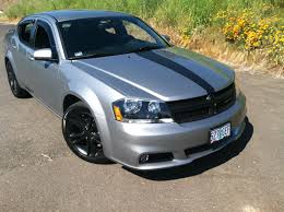 In certain respects it's less sophisticated than some competitors, but it's powerful, comfortable and reasonably economical to operate. First New Car 2013 Dodge Avenger 3 6l Sxt Stripe Badges Wheels And Grill Were All Done By Myself Dodge Avenger Big Family Car Dodge