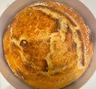 Why does bread stick to wax paper when baking?