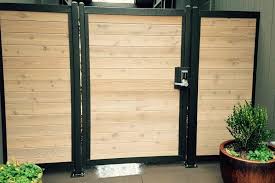 Metal gates with wooden slats. How To Build A Horizontal Slat Fence The Easy Way