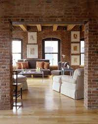 Loft In Stile Americano Foto 15 40 Designmag Salotti Minimalisti Saloni Rustici Appartamento Rustico