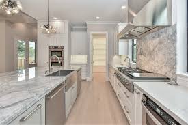 What makes this kitchen design so sleek? Designing Your Dream Kitchen Make Room For A Second Dishwasher Here S Why Arieli Custom Homes