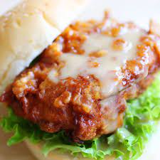 It is a dish of thick yellow noodles braised in thick dark soy sauce with pork, squid, fish cake and cabbage as the main ingredients and cubes of pork fat fried until crispy (sometimes pork liver is included). The Meatmen Har Cheong Gai Burger Facebook