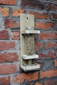 Use a super adhesive to fix the wood piece of this plan! Wine Bottle Bird Feeder Chickenstreet