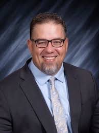 Nice graduation photo featuring Dr. Robert Coe (at right) and Dr. James  Horton (Academic Village Dean and Professor of Biology).