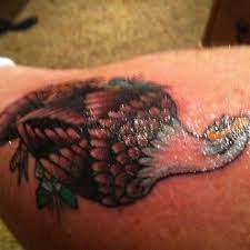 One can get a tattoo of the peacock feather to indicate that they are in touch with their divine nature and feel royal due to it. Photos At Royal Peacock Tattoo Parlor Midtown 2101 P St